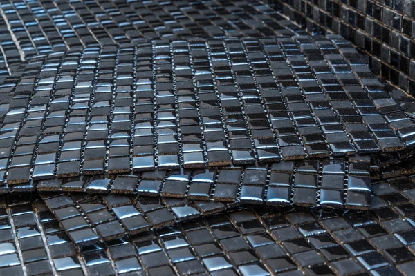 Azulejos em mosaico preto — Fotografia de Stock