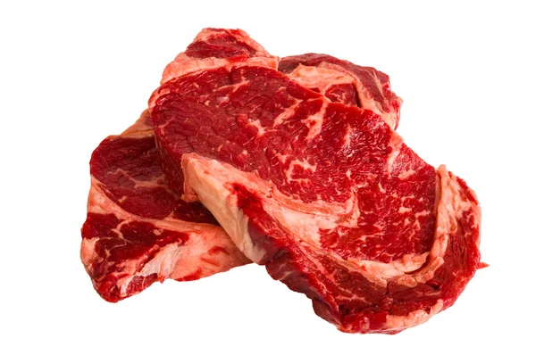 Ribeye steaky izolovaných na bílém pozadí — Stock fotografie