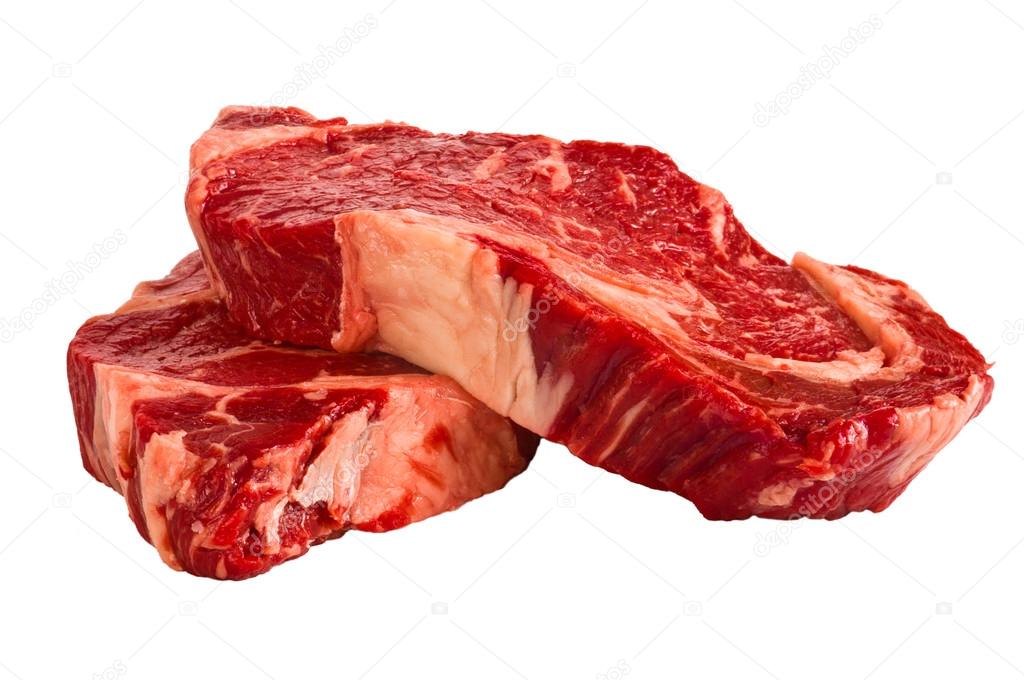 Ribeye steaks isolated on white background
