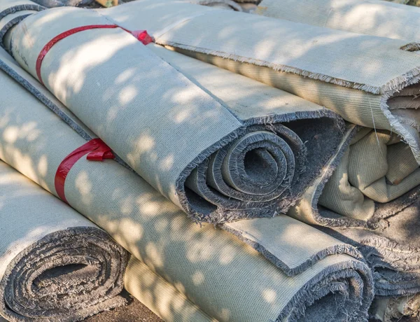 old carpet rolls