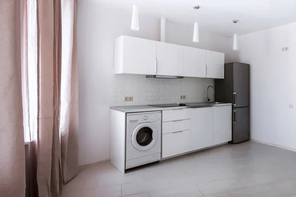 White modern minimal scandinavian style kitchen with window curtains — стоковое фото