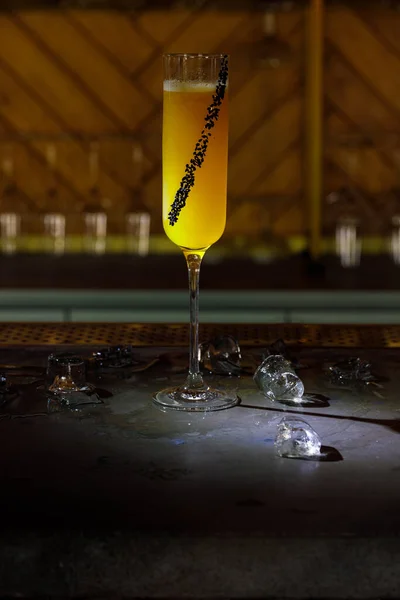 Alcohol bar, cocktail glass on bar counter, cocktail glass in a bar