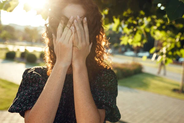 Cute Red Haired Girl Covers Her Smile Palms Her Hands — Stock Photo, Image