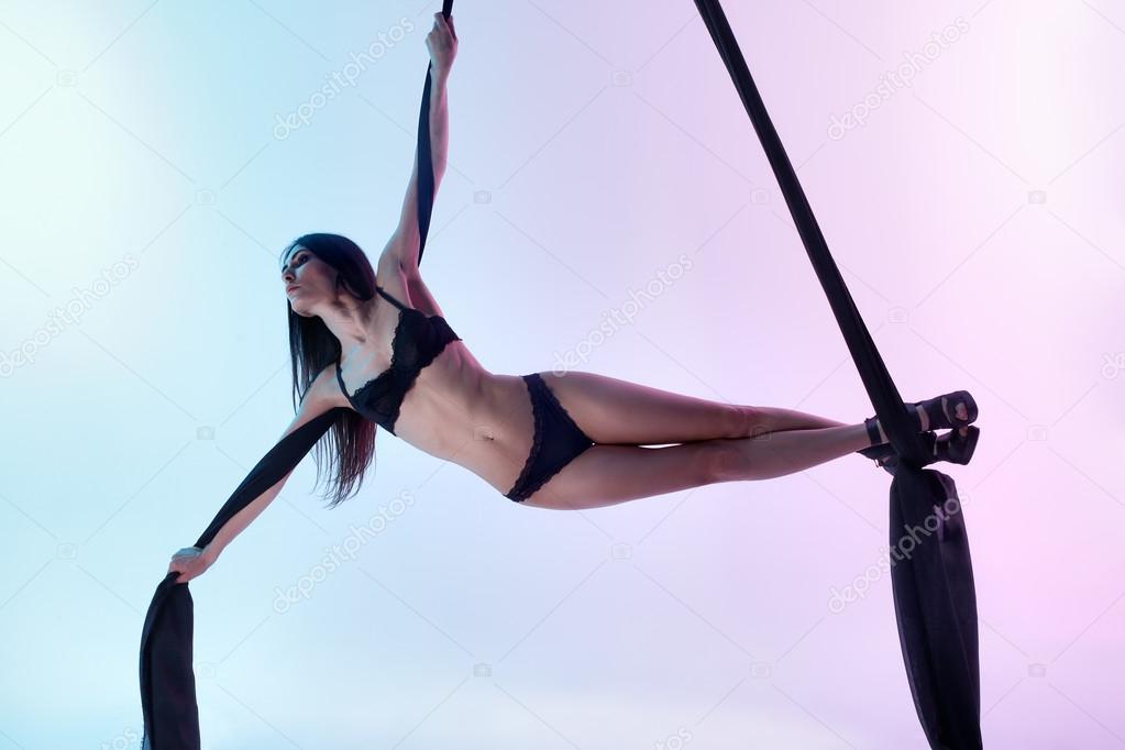 Girl flies acrobatic tissue