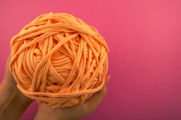 Hands with a ball for knitting — Stock Photo, Image