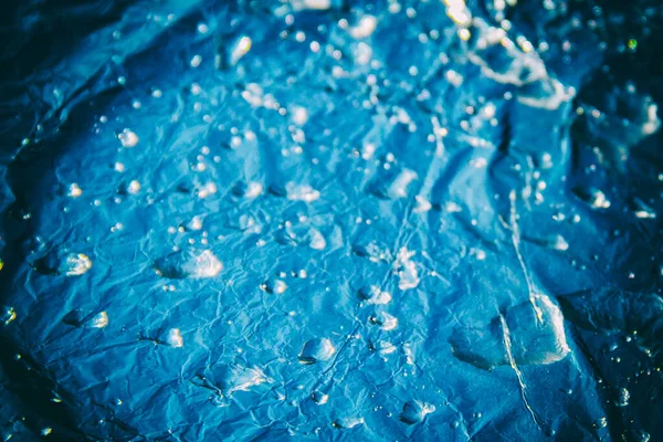 Μπλε υφή, φόντο. Αφηρημένη, αντίγραφο spase. Θολή, σταγόνες νερού. — Φωτογραφία Αρχείου