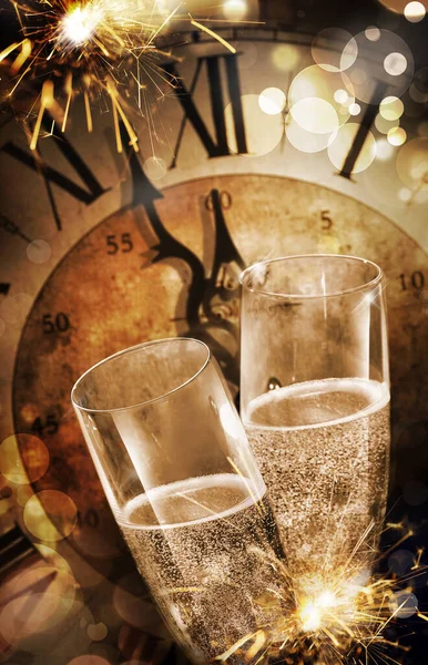 Close Two Champagne Flutes Toasting Vintage Clock Midnight Party Fireworks — Stock Photo, Image