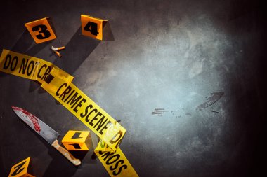 Bloody knife and cigarette stubs at a police crime scene with yellow tape and numbered clues with copy space alongside clipart