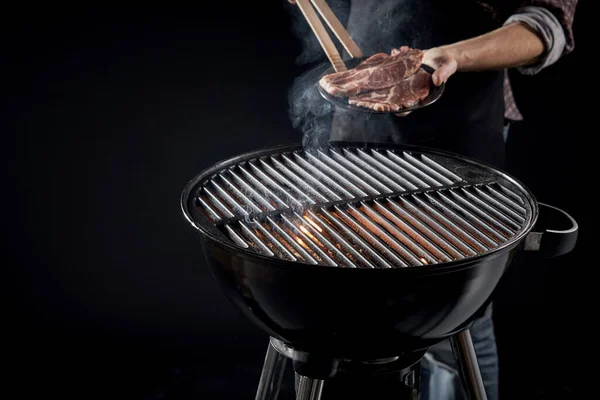 Man Place Raw Meat Hot Bbq Fire Glowing Coals Taking — Stock Photo, Image