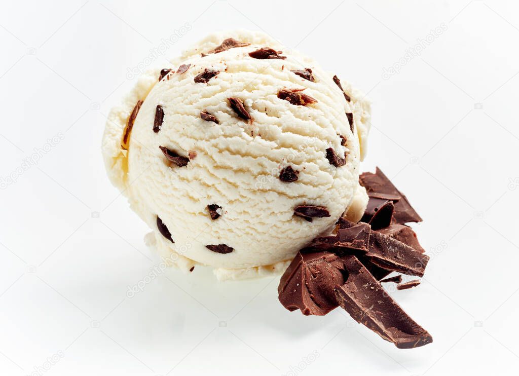 Gourmet Italian stacciatella chocolate and vanilla ice cream with flakes of chopped candy and cacao beans as ingredients alongside isolated on white for advertising