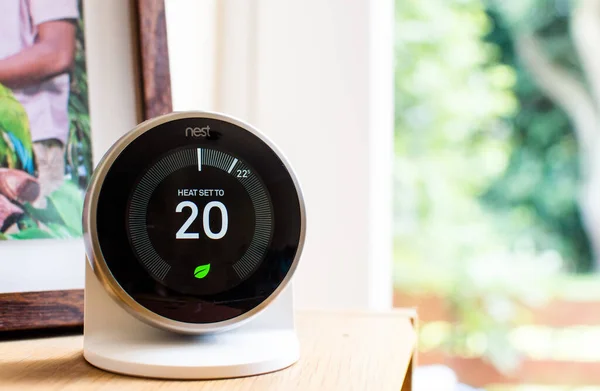 Nest Thermostat Showing Degree Celcius Placed Table Next French Window — Stock Photo, Image