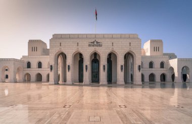Muscat,Oman - 04.04.2018: The Royal Opera House Muscat. Built by Sultan Qaboos, huge fan of classical music. Marble facade, floor and arches. Arabian architecture. clipart