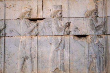 İran 'ın antik Persepolis şehrinin kalıntıları, heykelleri ve duvar resimleri. Antik Pers İmparatorluğunun en ünlü kalıntıları..