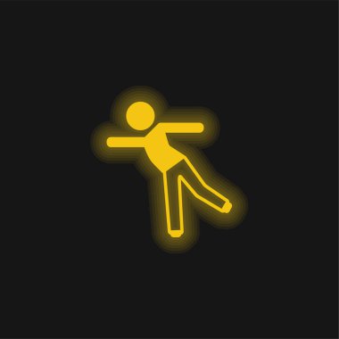 Tek bacaklı sarı parlak neon ikon üzerinde duran çocuk