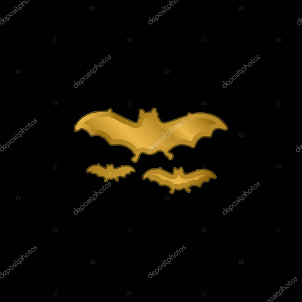 Bats Flying gold plated metalic icon or logo vector