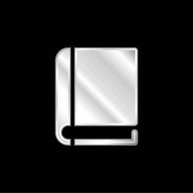 Kara kaplı gümüş kaplamalı metal simgelerle kaplı kitap