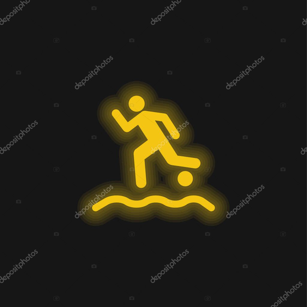 Beach Soccer Player Running With The Ball On The Sand yellow glowing neon icon