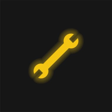 Ayarlanabilir İngiliz anahtarı sarı parlayan neon simgesi