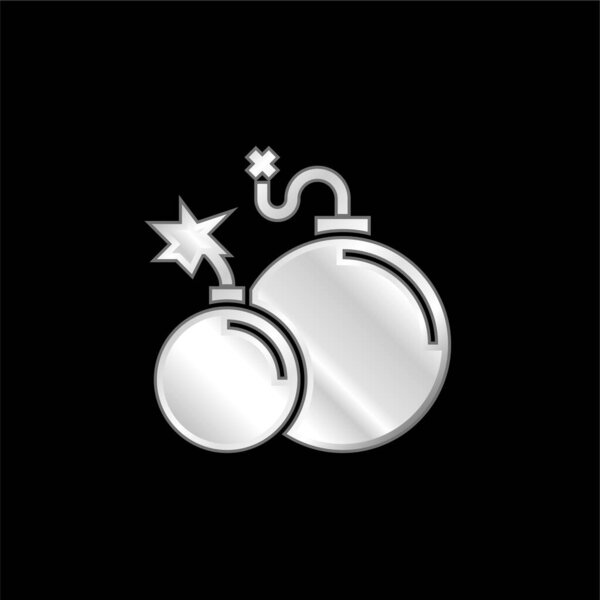 Серебристый металлический значок атомной бомбы