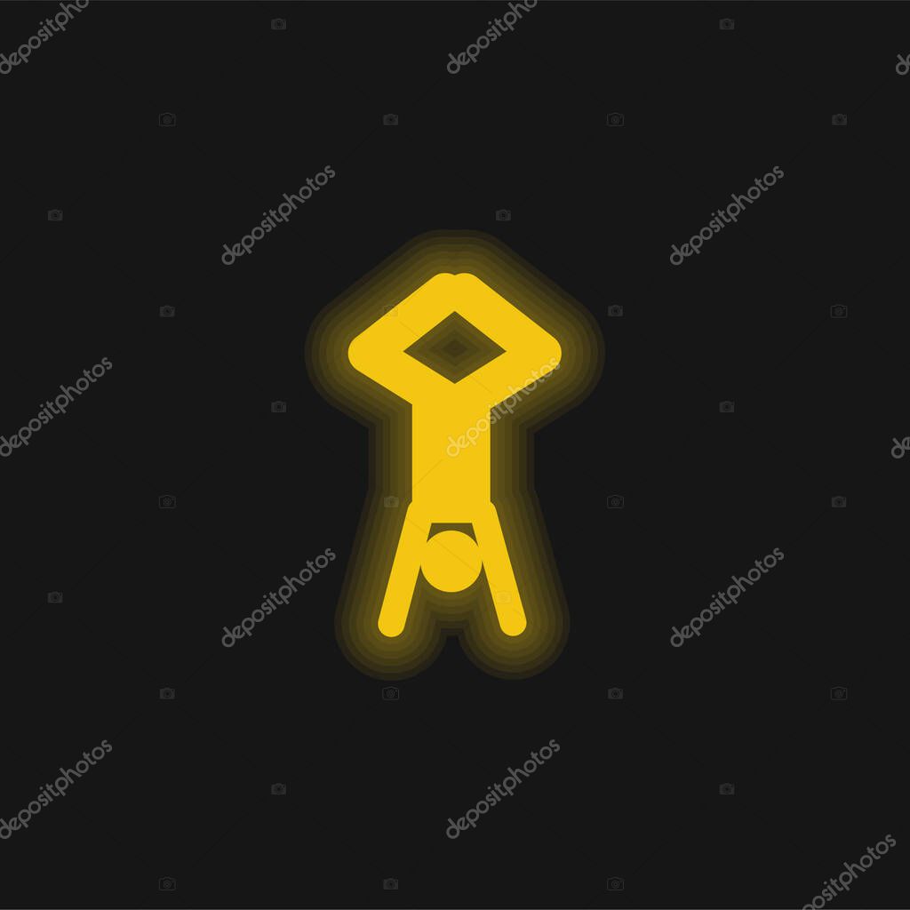 Acrobat Posture Silhouette With Head Down And Legs Up yellow glowing neon icon