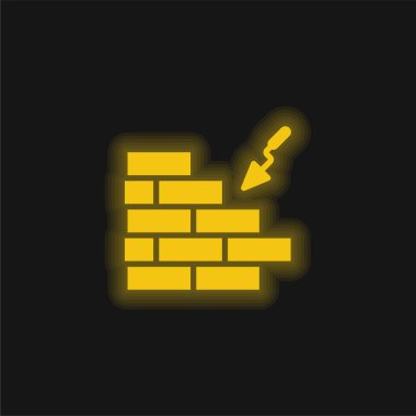 Tuğla Duvar sarı parlak neon simgesi