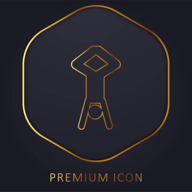 Baş aşağı akrobat duruşu ve bacakları altın çizgi prim logosu ya da simgesi ile yukarı kalkıyor.