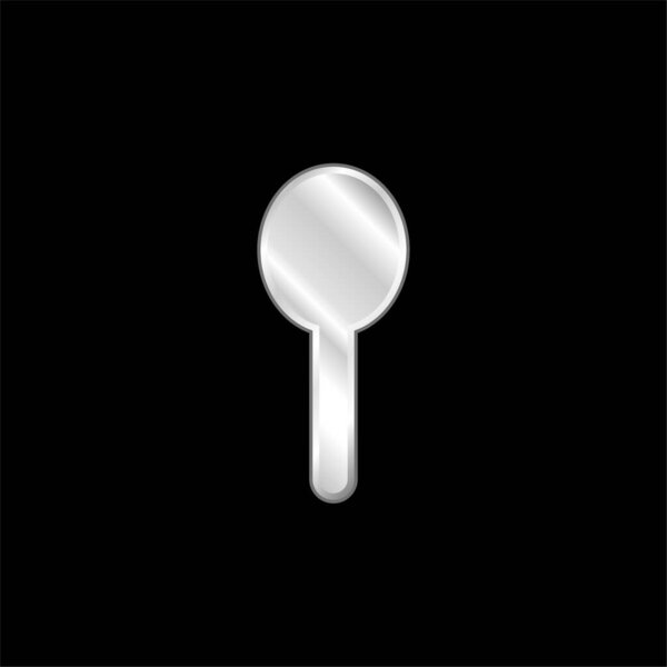 Черный силуэт объекта, похожего на серебряную ложку