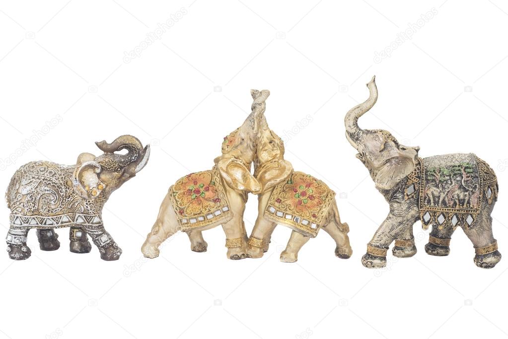 Three figures of Indian elephants