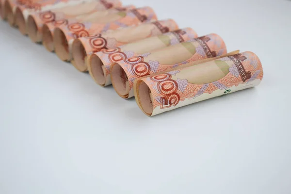 Russian 5000 banknotes rolled. Money background. Selective focus.