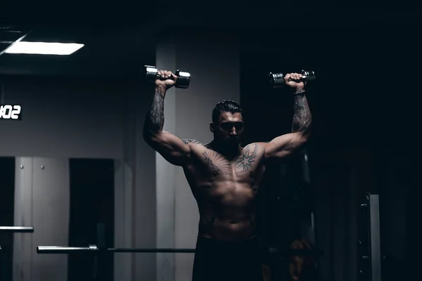 Muscular Male Athlete Tattooed Naked Torso Standing Dark Gym Doing — Stock Photo, Image