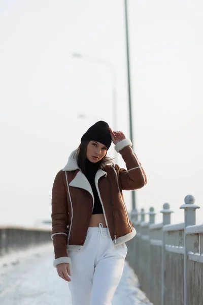Alluring Woman Wearing Brown Sheepskin Jacket Hat Looking Camera Standing — Stock Photo, Image