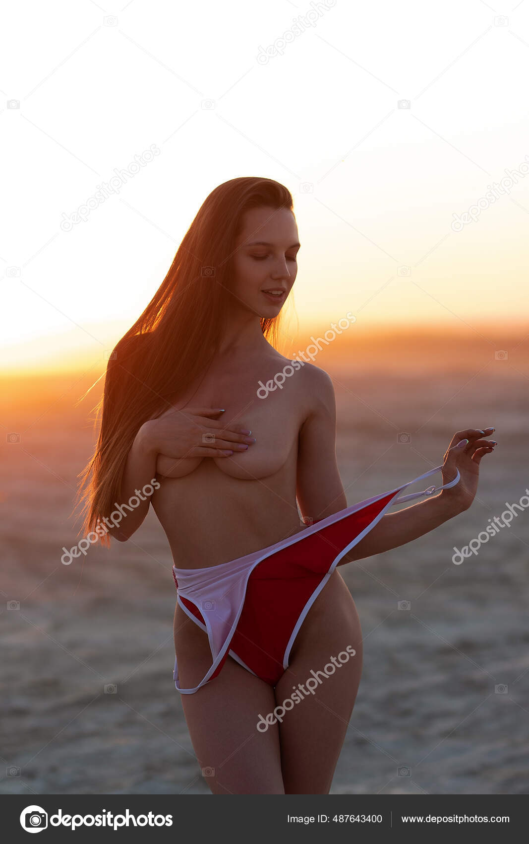 Side View Sensual Topless Female Traveler Bikini Touching Long Dark Stock  Photo by ©3kstudio 487643400