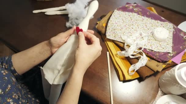 Female Hands Creating Plush Doll — Vídeo de Stock