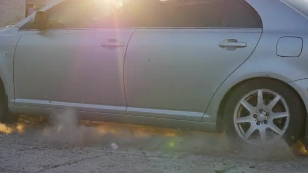 Car Leaving Dusty Cloud — Stockvideo