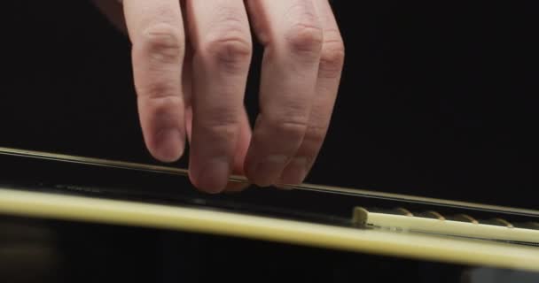 Extreme Close Fingers Strumming Strings — Vídeo de Stock