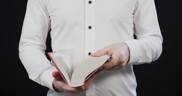 Person Browsing Book — Video Stock