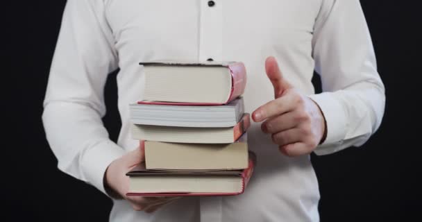 Person Counting Books Held Hand — Stockvideo