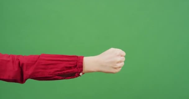 Згорнутий Кулак Проти Зеленого — стокове відео