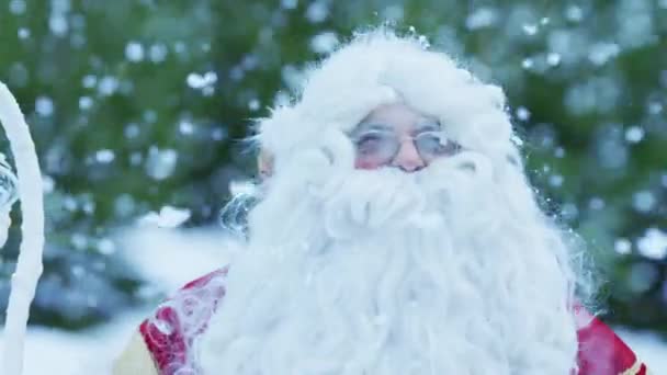 Santa Claus Enjoying Snowfall — Stock Video