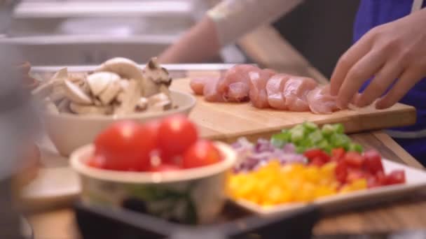 Woman Slicing Chicken Breast Vegetables — Stock Video