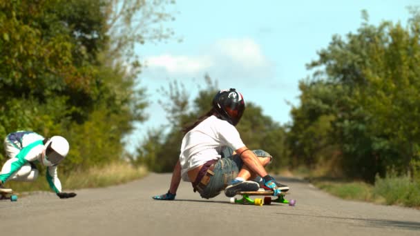 Men Longboarding Road Slow Motion — Stock Video