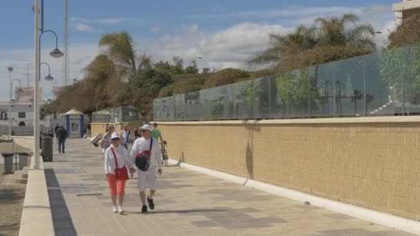 Tilt Tourists Walking Lighthouse — Video