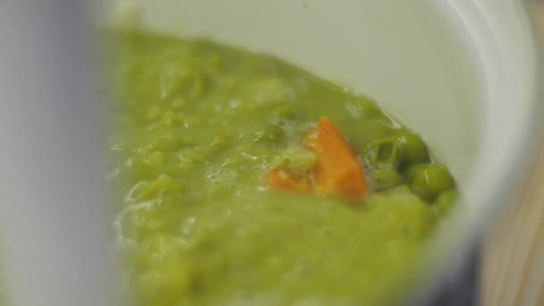 Hand Blender Mixing Pea Cream Soup — Stock Video