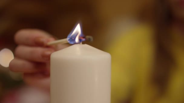 Woman Lighting Candle Match — Stock Video