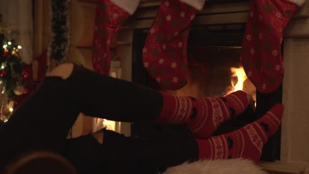 Feet Front Fireplace — Video Stock