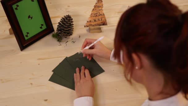 Woman Writing Christmas Cards Video Clip