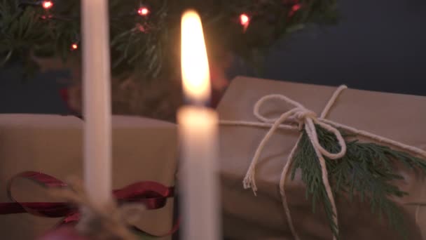 Christmas Presents Seen Candles — Stock Video