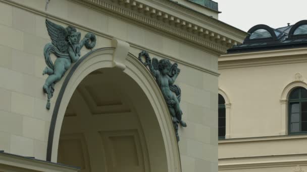 Angel sculptures on the Hofgarten Arch
