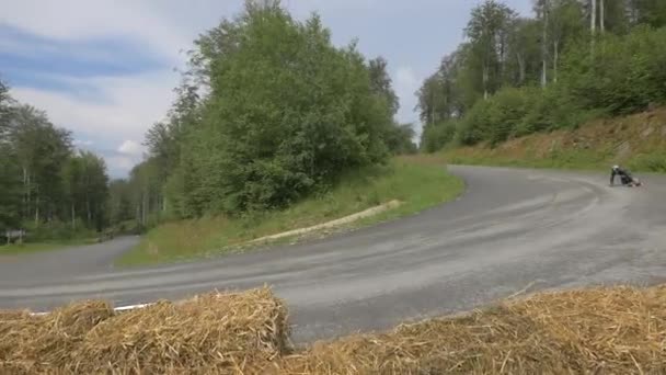 Racer Heading Hay Bales — Stock Video