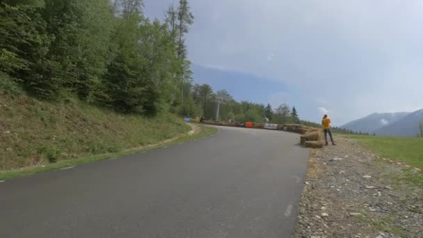 Longboarder Stopping Road — Stock Video